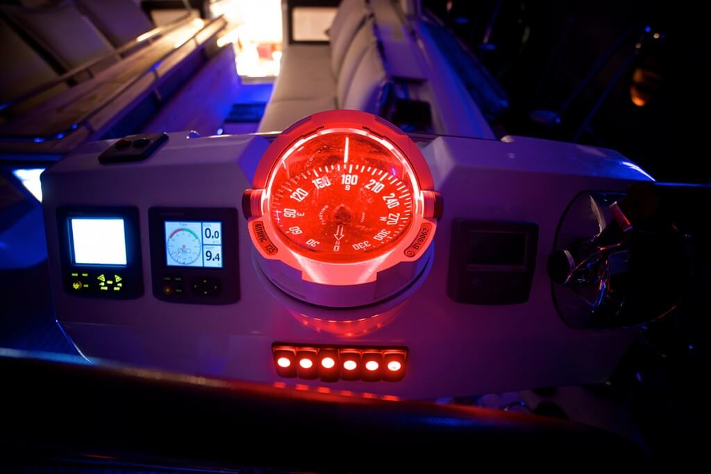 luxury compass on the yacht control panel