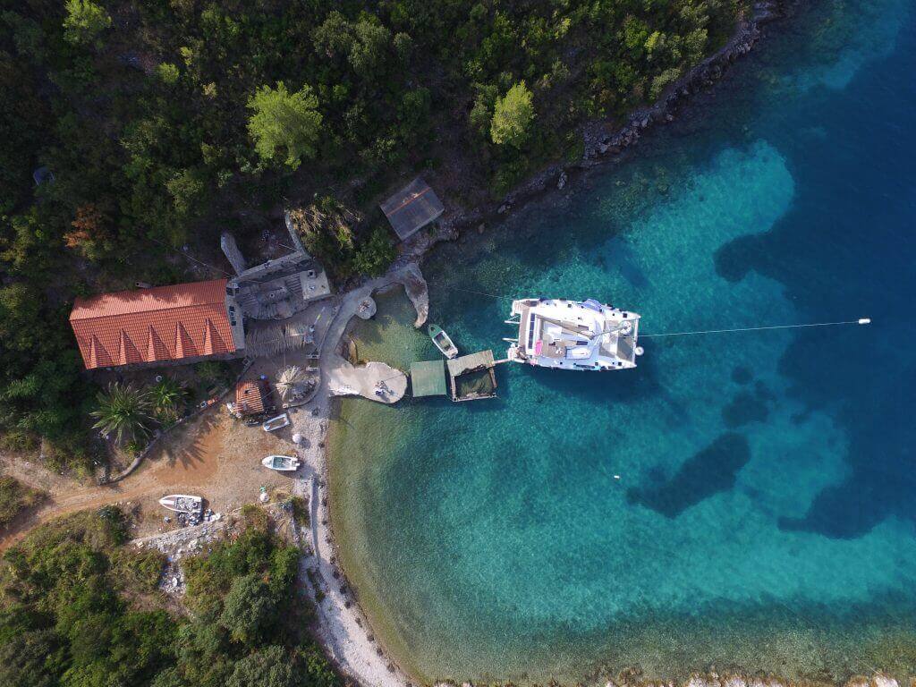 yacht parked on an island